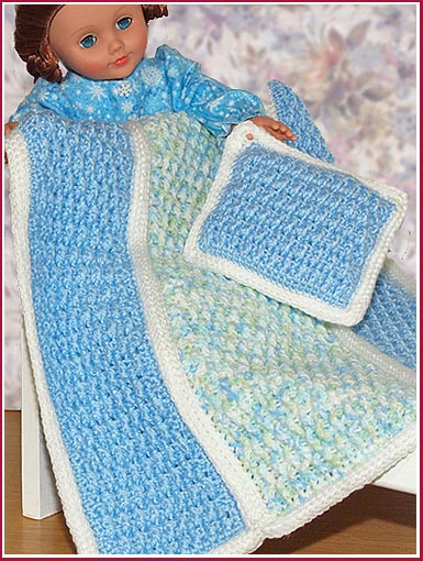 Your little girl's favorite 18 inch or baby doll can cuddle up with her very own afghan and pillow!
